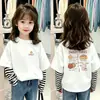 Camiseta de manga comprida para meninas, estilosa e moderna, algodão puro, top para o início do outono, casual estilo coreano, falsa peça dupla, camiseta infantil de desenho animado