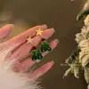 Brincos de Árvore de Natal Estrela Dourada de Inverno para Mulheres Design Único de Nicho Brincos de Árvore de Natal Meteoro Elegantes de Alta Qualidade