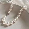 Lujo Ligero Exquisita Cadena de Clavícula de Perlas Blanco Gris Diseño de Lujo Ligero Sensación Elevada Elegante Cadena para el Cuello Explosiones de Moda