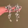 Pendientes de Borla de Perla Flor de Aguja Plateada Pendientes Retro Franceses de Alta Gama Pendientes de Diseño Exagerado con Personalidad Europea y Americana