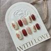 Unhas postiças artesanais Long Island ice Camélia manicure atacado outono e inverno branco artesanal unha de fototerapia Dedo falso âmbar
