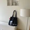 Bolso de hombro casual de gran capacidad, estilo nuevo para primavera y verano, para estudiantes, adecuado para la escuela y el trabajo, bolso tote simple y elegante para mujer