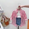 Conjunto Transfronterizo para Niñas 2026 Moda Infantil Estilo Coreano Camisa de Manga Larga a Rayas + Chaleco Pantalones Conjunto de Tres Piezas