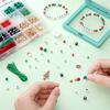 Caja de set de Navidad de 24 compartimentos pulsera cuentas sueltas accesorios DIY hecho a mano casero pulsera de cuentas material para collares cuentas