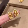 Nuevos Pendientes Huecos Plegados con Forma de Flor Ovalada de Estilo Vintage con Diamantes, Moda Exquisita Francesa, Lujo Ligero y Sensación de Alta Gama