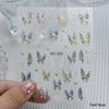 Calcomanías de Arte de Uñas de Mariposa Acuarela Bronceada Color Líquido Alas de Mariposa Soñadoras Inteligentes Flores Tridimensionales Pegatinas de Estrella Mans