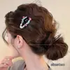 Lindo pasador de pelo de gatito negro, moderno y versátil para mujeres, perfecto para sujetar el flequillo y el cabello lateral, con un diseño de pinza de pico de pato de alta gama