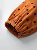 Camisa casual vintage de lunares para mujer con tela acanalada texturizada, corte holgado, dobladillo plisado, top de manga larga, suministro