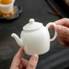 Tetera pequeña de cerámica de porcelana blanca de jade con grasa de oveja Dehua, tetera individual con filtro para preparar té, tetera pequeña con diseño de Fugui