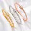 Lujo estilo europeo y americano, pulseras de resorte de diamantes completos, pulseras de bola giratoria incrustadas con diamantes, chapadas en oro, venta al por mayor para ventas transfronterizas