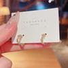 Pendientes asimétricos geométricos nuevos de Dongdaemun, Corea del Sur. Pendientes de moda de celebridades de Internet con el mismo estilo. Pendientes al por mayor.
