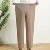 Pantalones extra grandes para mujeres de mediana edad y mayores, pantalones de estilo western para madre, moda de alta gama, pantalones rectos, nuevos para otoño e invierno, pantalones cálidos con temperamento