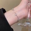 Brilhante e adorável! Pulseira Olho de Gato com Argola Vazada Super Brilhante Feminina de Luxo Leve Nicho Delicada Sensação de Alto Padrão