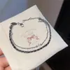 Pulseira com pingente de flor de zircônia em camada dupla, luxo leve, alta qualidade, moderna, design de pulseira simples, joias de nicho atacado