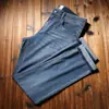 Estación europea primavera y verano fino lyocell tencel transpirable hielo oxígeno fibra fresca lavado elástico recto ajustado jeans