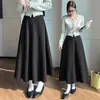 Nova saia de cashmere outono e inverno para mulheres, saia midi de lã de cintura alta com barra larga, saia evasê que cobre os quadris, saia longa de lã