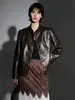 Chaqueta de cuero estilo minimalista con cuello alto, textura vintage de otoño, corte holgado, abrigo corto de hombros caídos, chaqueta de cuero de alta gama para el día a día