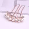Versão coreana do Pearl quatro dentes pente strass cabeça arco pente de cabelo para trás acessórios de cabelo adulto atacado
