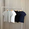 Top de punto de manga corta con cuello polo de color liso estilo coreano con bordado de caballito para mujer, nuevo top versátil de moda de verano