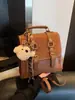 Bolsa Retro Mate Moda Femenina Versátil Mochila de Estudiante Otoño 2025 Nueva Tendencia Callejera Ligera Mochila de Viaje