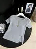 Blusa de tricô de seda gelada de manga curta para mulheres 2026 Primavera/Verão estilo fino gola redonda camiseta top solto que rejuvenesce