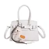 Bolso pequeño cuadrado casual de moda nueva tendencia primavera 2026 bolso de hombro cruzado simple único para mujer con textura