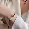 Tide nacional ágata roja frijol de acacia cuerda negra collar cadena de suéter cadena de clavícula Nueva moda china collar Joker para mujer Venta al por mayor