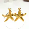 Novos Brincos de Aço Titânio Banhados a Ouro Estrela do Mar de Luxo Acessível Europeu e Americano para Mulheres Férias na Praia Brincos de Aço Inoxidável