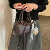 Bolso Cruzado 2026 Bolso Versátil Bolso de Viaje para el Trabajo Bolso Elegante para Mujer Almohada Lazo Nudo Sensación Nicho Nuevo Gran Capacidad
