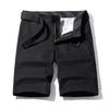 Pantalones cortos casuales para hombre 2021 Verano Moderno Combinable Lavado Delgado Algodón puro Peto Pantalones deportivos holgados Moderno