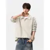 Otoño 2026 Nuevo para Hombre Vintage Ropa de Trabajo Moderna Falso Dos Piezas Corte Holgado Hombro Caído Cuello Polo Manga Larga Top