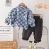 Comercio exterior traje de primavera y otoño para niños estilo coreano ropa de otoño para bebé moda callejera de moda camisa de oso a cuadros manga larga traje de dos piezas