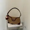 Bolso de hombro nuevo con bloques de color para mujer, bolso cruzado de moda para el día a día, bolso simple y versátil de cuero suave para debajo del brazo con un diseño de nicho de alta gama