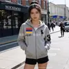 Sudadera con cremallera y estampado bordado, estilo europeo y americano, transfronteriza 2026, manga larga, moda urbana, versátil casual, venta al por mayor de fábrica
