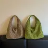 Bolso de mujer de lunares estilo coreano 2026, con un fresco estampado floral, un diseño juvenil y un estilo de bolso tote moderno, retro y chic