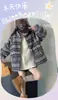 Abrigo de invierno para niñas 2026 nuevo estilo deportivo estilo coreano acolchado y engrosado abrigo de jacquard para niños mayores transfronterizo