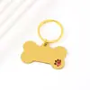 Colgante de pata de perro para mascotas transfronterizo con diseño de goteo de aceite, material en blanco de acero inoxidable, placa de identificación de perro de hueso grabada con láser, llavero de metal