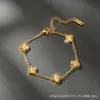 Pulsera de trébol de cuatro hojas transfronteriza, una pieza lujosa y de alta gama, un diseño de nicho y minimalista, un accesorio de joyería popular para mujeres, en estilos europeo y americano