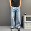 Jeans básico versátil de perna larga e corte reto para homens e mulheres, casual urbano, caimento solto, modelagem que afina a silhueta, estilo relaxado, calça longa solta