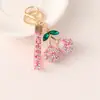 Llavero Creativo Lindo de Fruta Cereza de Aleación con Pedrería Colgante para Bolso Accesorios de Regalo Transfronterizos