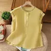 Camisa bordada de color liso con mangas voladoras para mujer, estilo literario, reductora de edad, para verano, chic, de lino, cuello redondo, top de algodón y lino