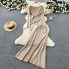 Conjunto de Estilo Francés para Mujer en Otoño e Invierno con Tirantes Asimétricos y Prendas de Punto de Manga Larga que Ceñen la Cintura + Faldas de Cintura Alta