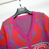 Cárdigan de punto jacquard geométrico retro de manga corta para mujer, otoño, cuello en V, color de contraste, estilo occidental, top suéter versátil