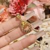 Colgante de gran tamaño de joyería de alta precisión de la industria pesada europea y americana Camellia para mujer, colgante de lujo retro con diamantes de circonio brillante chapado en oro de 18 quilates