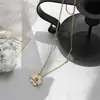 Collar choker estilo europeo y americano flor pequeña geométrica viento frío hebilla ot nueva irregular cadena corta para clavícula