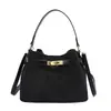 Bolso tipo cubo más vendido transfronterizo, acabado mate retro, bolso de hombro versátil para mujer, venta al por mayor para exportación, bolso cruzado, bolso para el trabajo