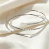 Pulseira de Braço Nova de Metal Brilhante Transfronteiriça Europeia e Americana Moda de Nicho Pulseira de Braço Aberta em Onda Europeia e Americana Mais Vendida Decoração de Braço