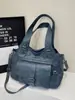 Bolso transfronterizo para mujeres oficinistas, bolso de hombro versátil de alta gama de nicho para el día a día, bolso cruzado de cuero suave
