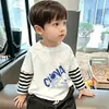 Camiseta Base Rayada Patchwork para Niños Modelo Nuevo 2026 Camiseta de Manga Larga Infantil Algodón Puro Top de Otoño para Niños Mayores