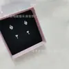 Hellopuppy Brincos de Chave Assimétricos de Amor Cheios de Diamantes Fivela de Trava de Aço Titânio Empilháveis com Furos Duplos na Orelha Doce Cool y2k Feminino
